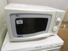 A Tricity microwave oven, (sold as seen).