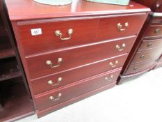 A 2 over 3 mahogany effect chest of drawers.