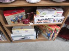 A mixed lot including Wade Cat Christmas crackers (no contents) a vintage apple peeler,