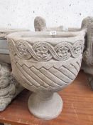 A Mayan circular urn with Aztec design.