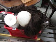 A box of wigs.