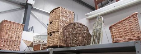 A mixed lot of basket ware, wrought iron shelf etc.