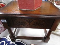 An oak stool.