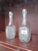 A pair of decanters.