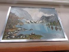 An oil on board mountain and lake scene signed M Brardwell.