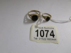 2 9ct gold rings set with French Jet, approximate total weight 6 grams.