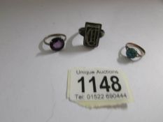 A 1945 German police ring, a silver ring set amethyst and a yellow metal ring set turquoise.