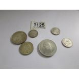 A small collection of coins including US, Canada and 1952 5/-.