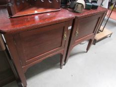 A pair of mahogany cabinets.