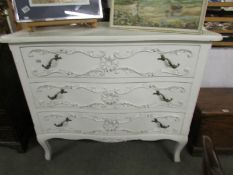 A shabby chic chest of drawers.