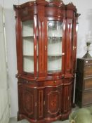 An Italian style modern display cabinet.