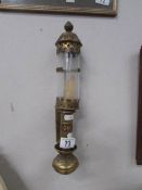 A brass GWR candle holder, glass a/f.