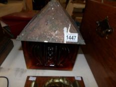 A Whitefriars style amber glass lamp shade with arts and crafts copper top (reputedly from Pheonix