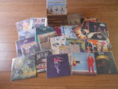 Approximately 60 progressive rock LP records.