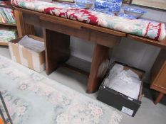 A 1940's draw leaf dining table.