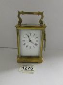 A fine brass carriage clock, in working order.