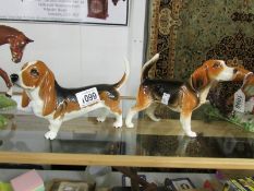 A Beswick bloodhound and a Beswick bassett hound.
