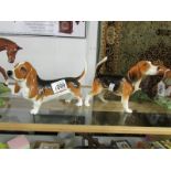 A Beswick bloodhound and a Beswick bassett hound.