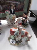 2 early 19th century seated Staffordshire figures and 2 other early Staffordshire figure groups