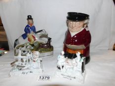 A Royal Doulton Toby jug, a Staffordshire figure and 2 Victorian fairings.