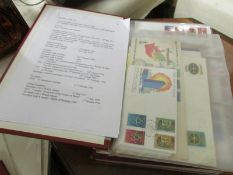 3 albums of stamps.