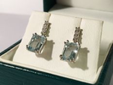 A pair of aquamarine and diamond earrings, stamped 18ct white gold.