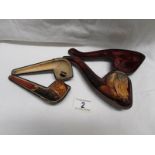 A cased Meerscham pipe in fair condition and another cased pipe a/f.