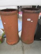 2 terracotta chimney pots.