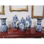 3 large Delph blue and white ginger jars (2 repaired) and a pair of blue and white Delph vases (1