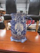 A blue and white jug stamped to base 'Etruria', a/f.