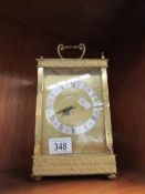 A carriage style clock.