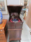 A cabinet gramaphone.