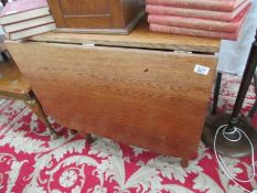 An oak gate leg table.