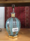 A large glass art deco scent bottle.