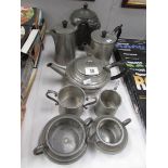 A 19th century pewter biscuit barrel, an arts and crafts teapot, chocolate pot etc.
