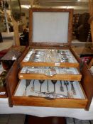 A unique 24 place setting silver canteen of cutlery in bespoke cabinet, 186 pieces,