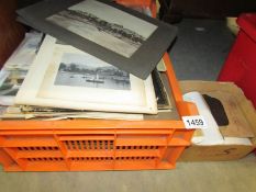 A large crate containing a quantity of old photo albums and loose photos including cartes de visite,