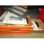 A large crate containing a quantity of old photo albums and loose photos including cartes de visite,