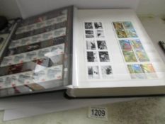 A large stamp stock book containing a quantity of British mint decimal miniature sheets and