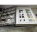 A large stamp stock book containing a quantity of British mint decimal miniature sheets and