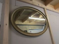 An oval mirror.