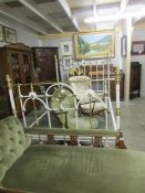 A good Victorian brass and iron bedstead with mother of pearl feature, complete with side rails.