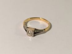 An art deco old cut diamond single stone ring, platinum set and 18ct gold stamped, size K.