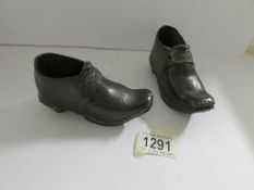 A pair of Victorian child's work boots/clogs.