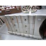 A silver coloured 3 drawer chest,.