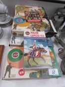 14 Airfix kits of WW2 soldiers/military figures and Airfix Polish Lancer 1815 kit (all boxed).