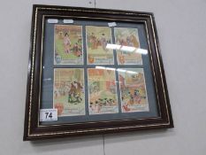 A framed and glazed set of Japanese cards.