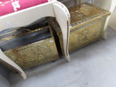 A brass magazine rack and a brass log box.