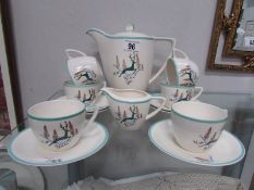 14 pieces of Crown Devon 'Greenland' pattern tea ware including cups, saucers, small jug and teapot.