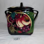 A Moorcroft 'Queen's Choice' two handled biscuit barrel.